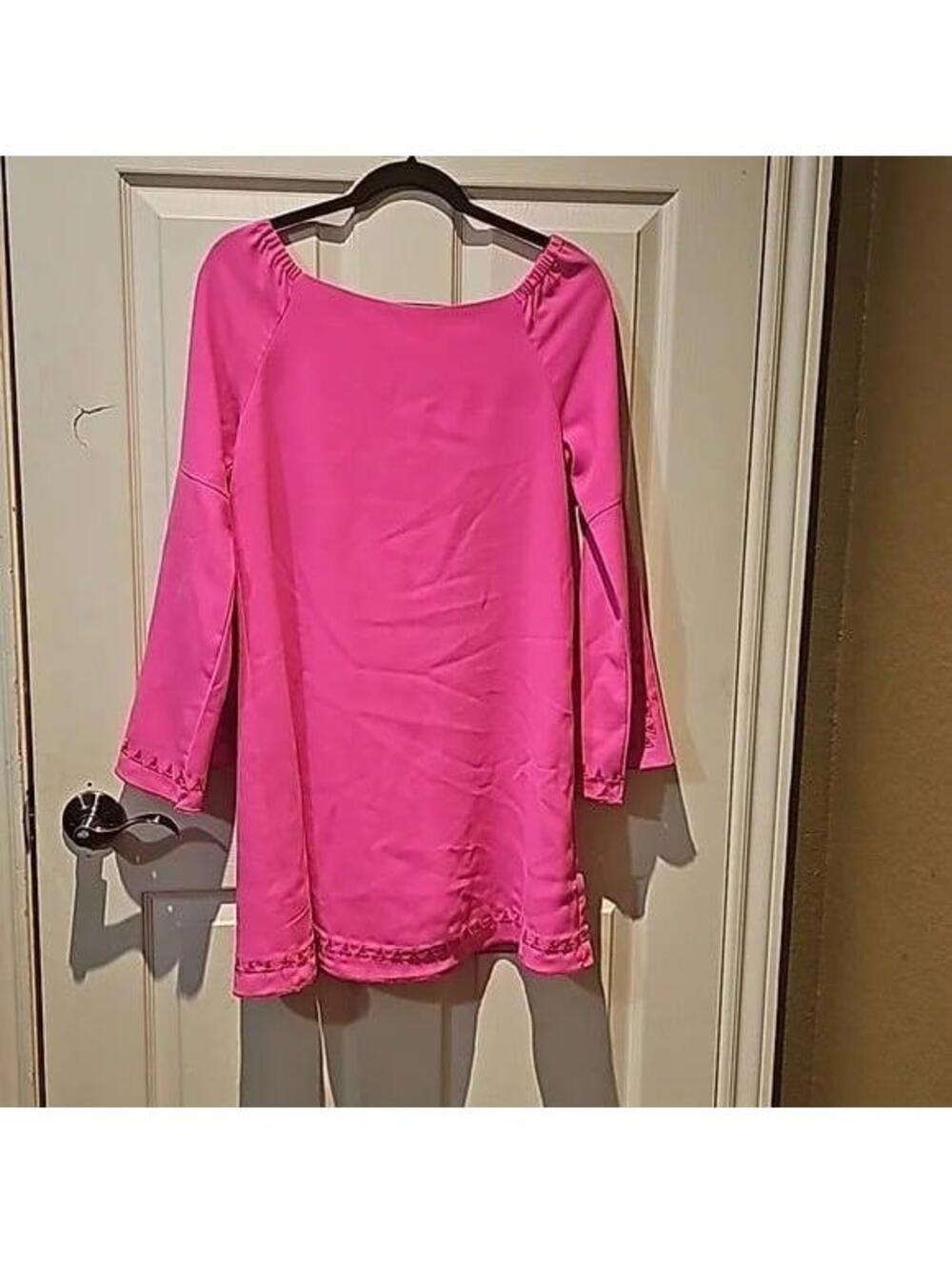 Sugar + Lips shift dress. Barbie pink with cut out detail on sleeves and bottom